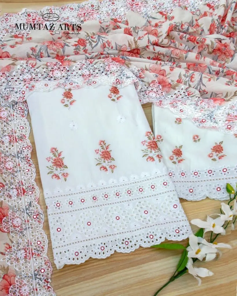 White cotton suit piece embroidered with pink florals and a scalloped cutwork edge