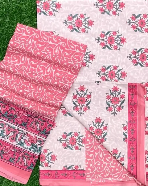 Rose-pink and ivory cotton printed with small floral sprigs